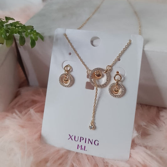 Set de Arete y collar Corazon Atrapado